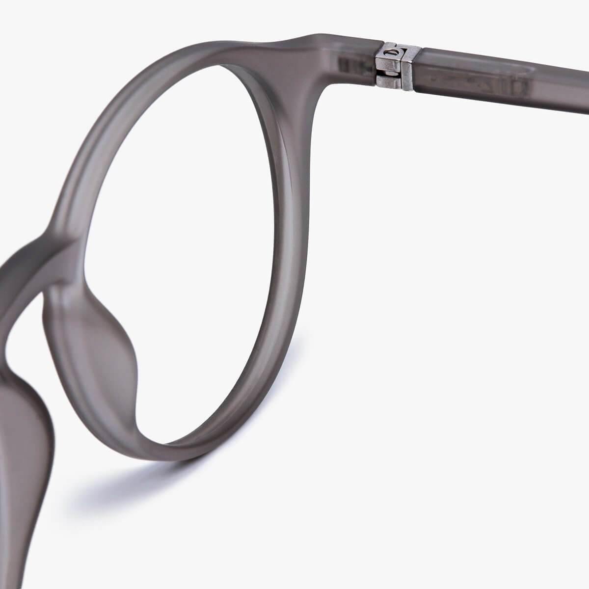 Close-up of Men's Læsø Grey semi-rimless eyeglasses with matte grey finish