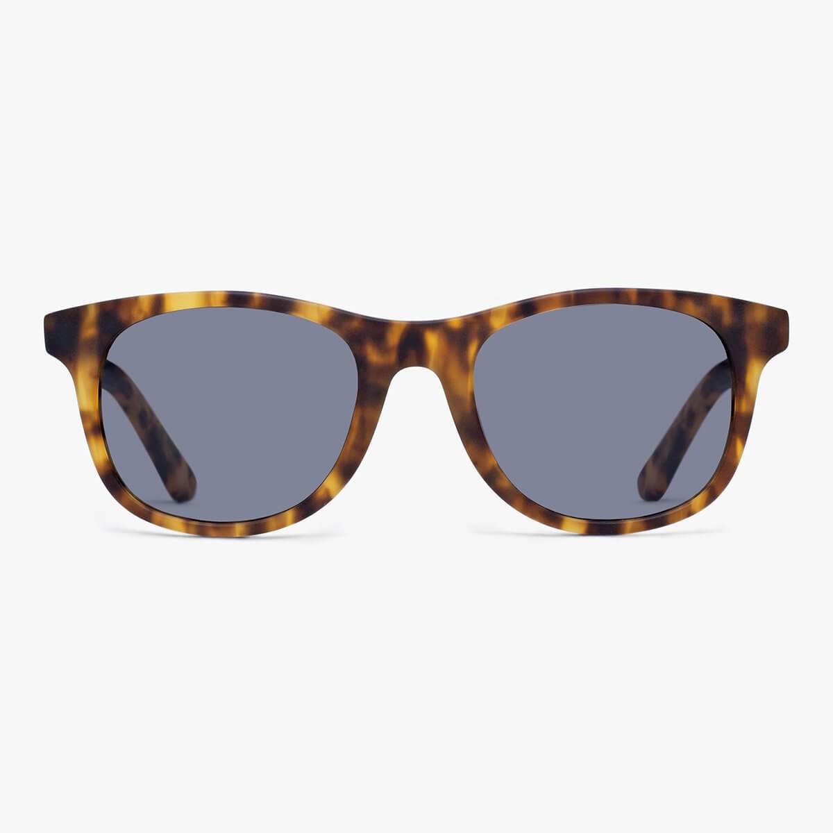 Tortoise shell sunglasses with dark lenses