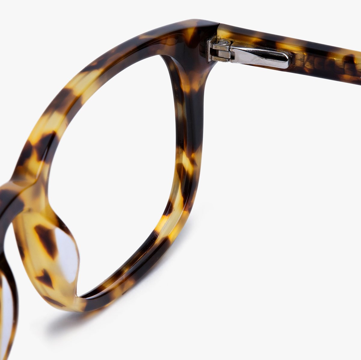 Tortoiseshell eyeglass frame with metallic hinge detail