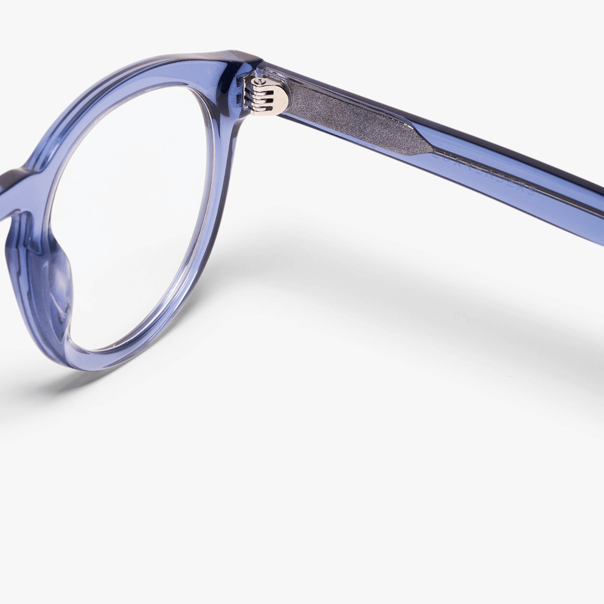 Crystal blue eyeglasses with a round frame and sleek design