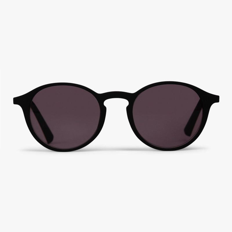 Women's Læsø black round sunglasses with dark lenses